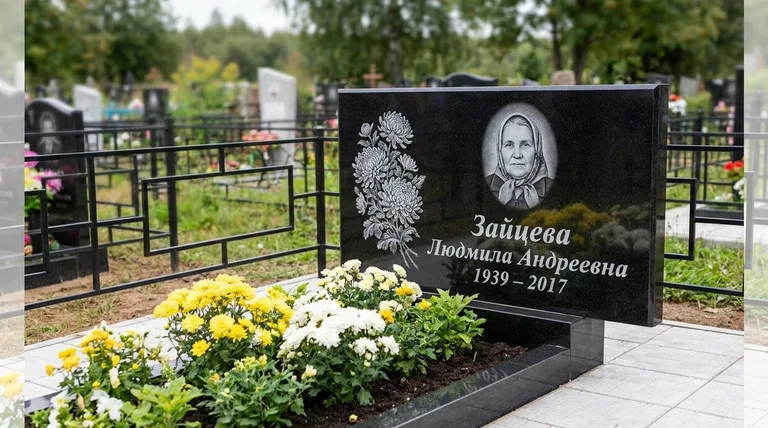 Памятник с гравировкой хризантем — выполненная работа «Зайцева» в Хабаровске